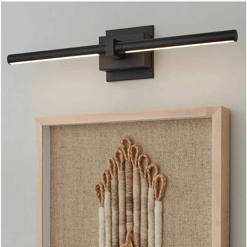 Accent art light wall sconce over a natural framed jute handmade wall decor